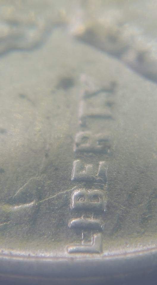 1943-Wheat-Penny-Struck-Through-Debris?